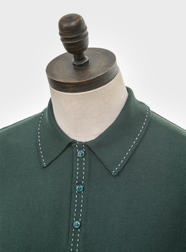 ART GALLERY CLOTHING SIXTIES MOD RETRO IVY STYLE KNITWEAR WHARTON Deep forest green, long sleeved, three buttoned knitted polo shirt with navy blue & off white saddle stitch on collar & placket. Fine gauge, retro style knitwear.